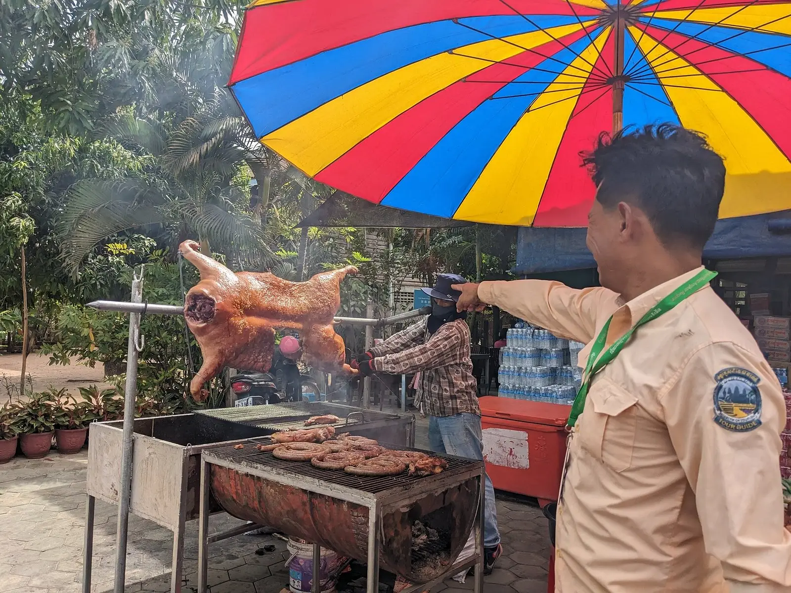 San showing guests a local roadside food stall near the temples